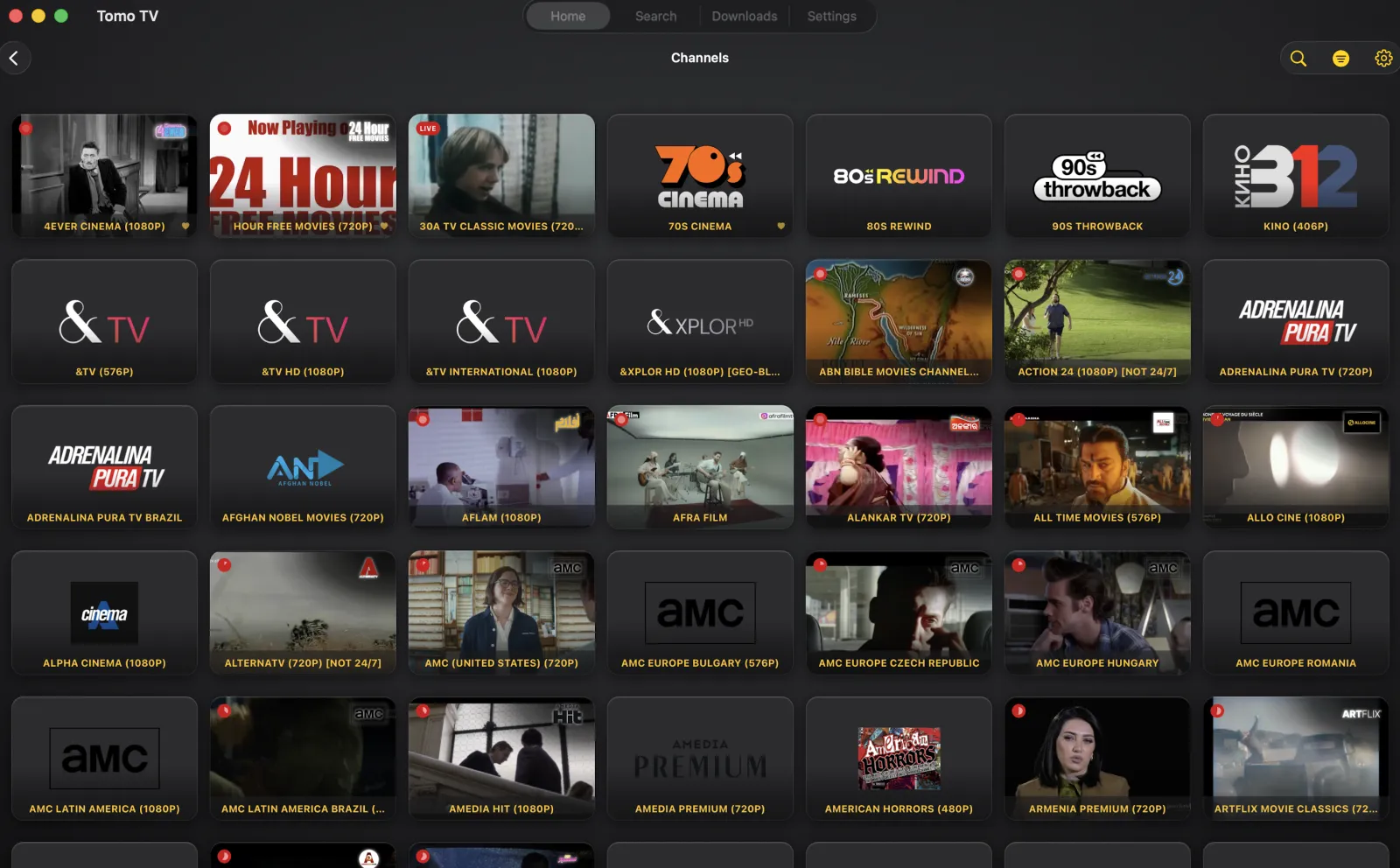 The Channels screen in Tomo TV's Mac app, rows of seven channel cards. Some show a frame of what is on with a red badge in the corner, and the rest show only a channel logo