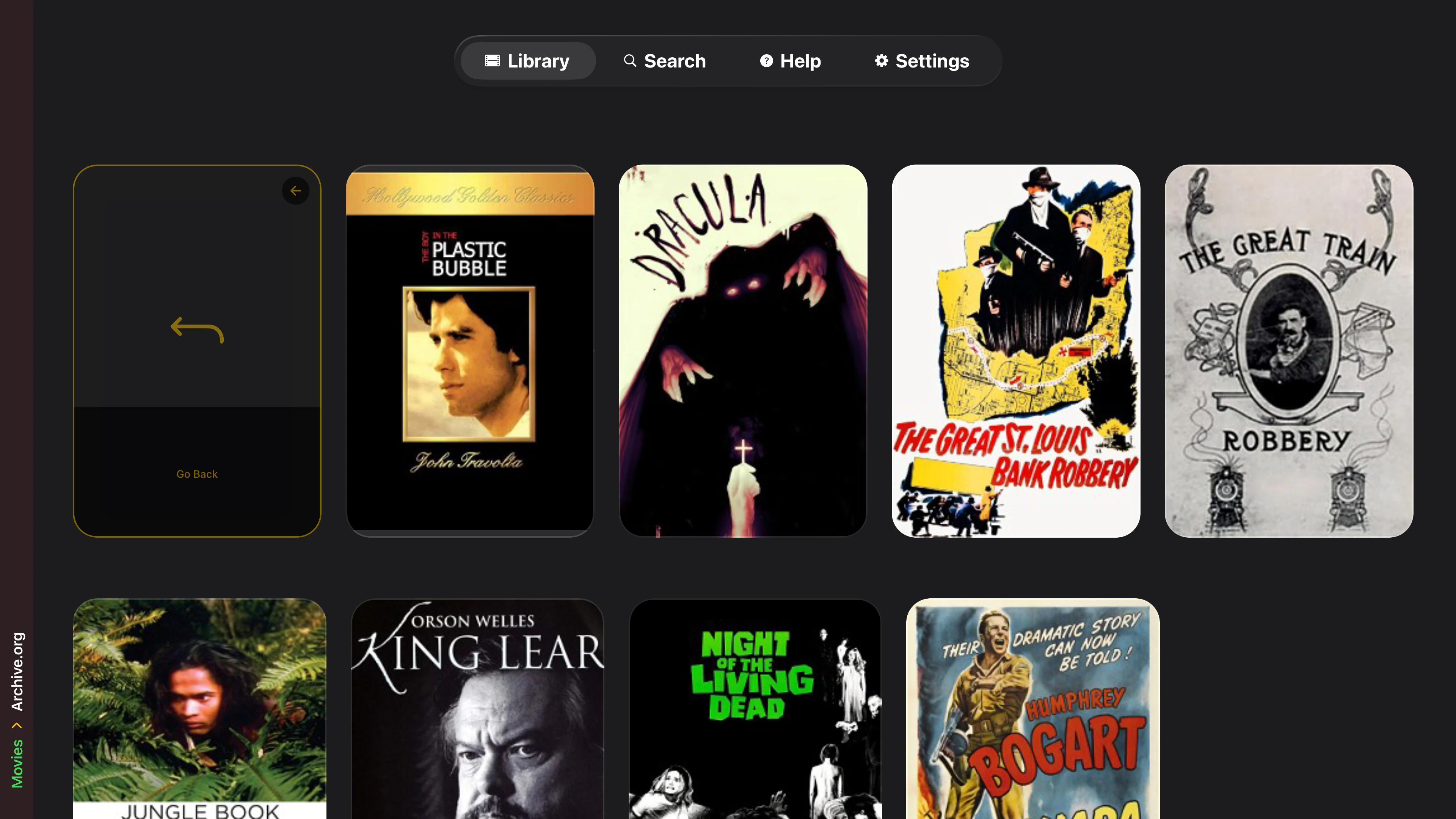 Tomo TV library view showing four main categories: Movies, Shows, Music, and Playlist