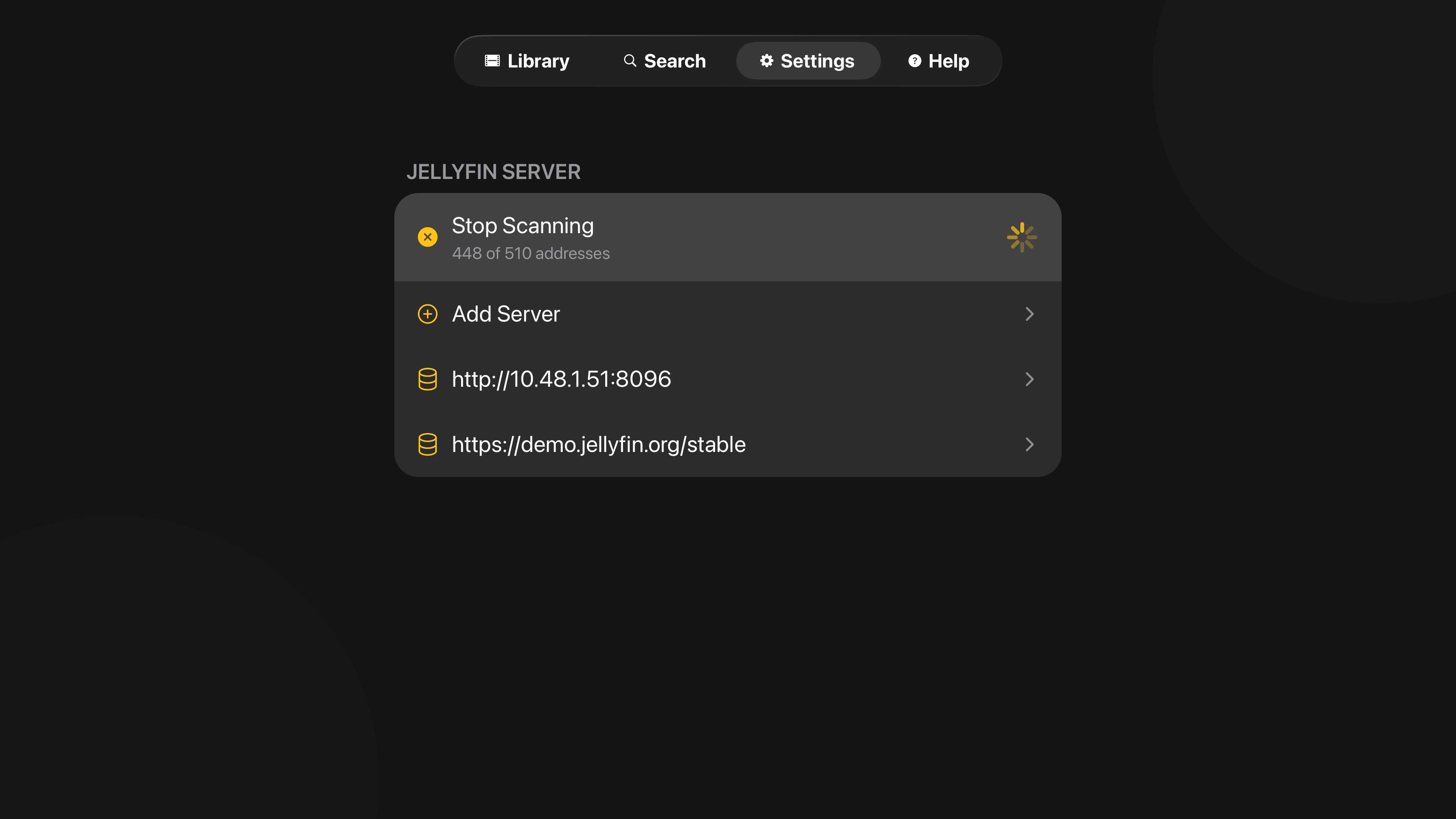 Tomo TV Settings screen mid-scan showing a Stop Scanning row with 448 of 510 addresses probed and a progress spinner