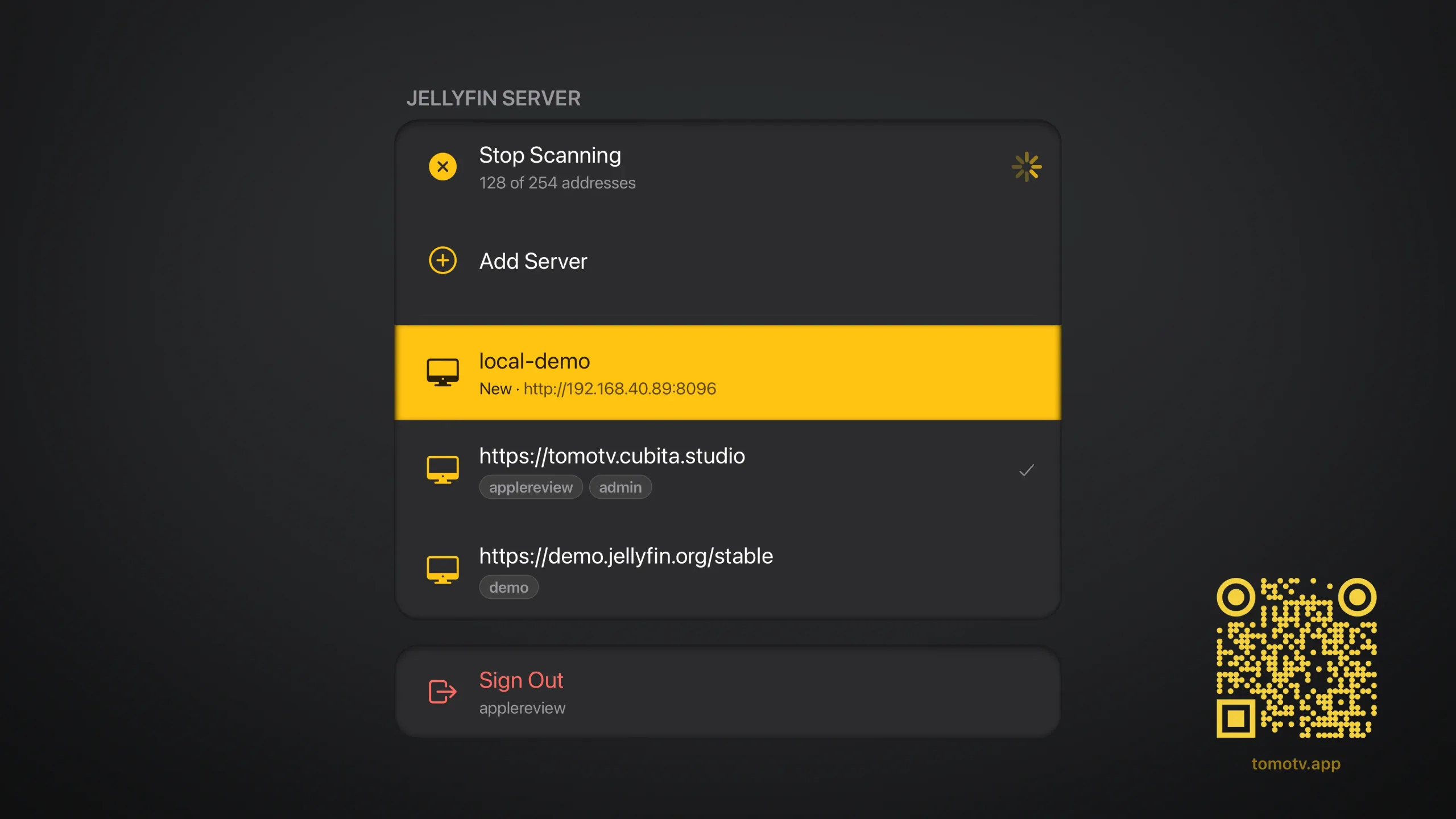 Tomo TV's server screen on Apple TV: a network scan running, a newly found server focused under it, the servers already saved below that, and a Sign Out row at the foot