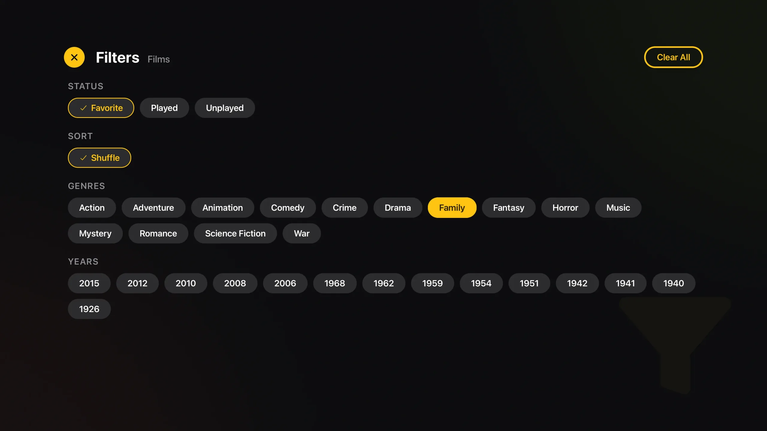 The Filters screen on Apple TV: Status, Sort, Genres and Years as rows of pills with Favorite, Shuffle and Family selected, and a Clear All button